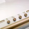 Витяжка кухонна Electrolux Rococo купольна 60см, 420м3/г, шампань (EFC226V)